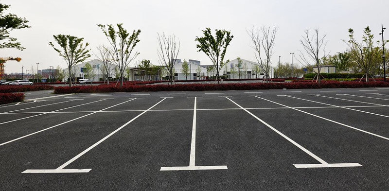 Low cost parking lot marking paint